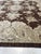 This hand knotted pile rug is a brown earth tone Agra rug made from natural wool. It serves as a classic traditional floor...