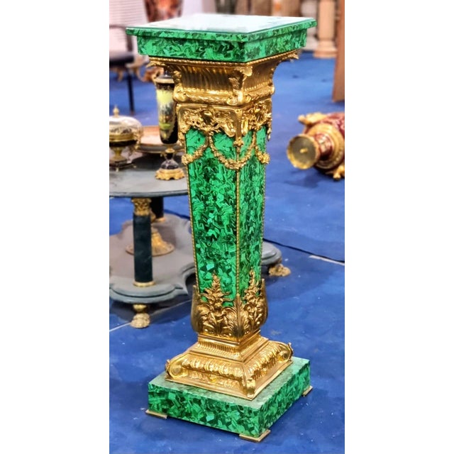 This elegant French Rococo style pedestal features a beautiful marbleized green finish accented by ornate bronze mounts...