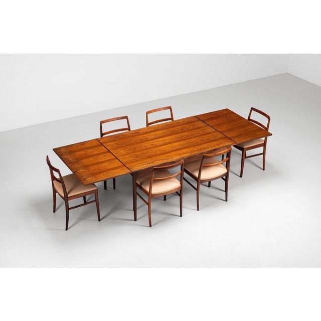 A large and refined extendable dining table designed by niels otto møller and produced by j.l. Møller møbelfabrik in...