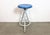 Vintage Industrial factory stool made in former Czechoslovakia during the 1960s It features a blue painted wooden seat and...