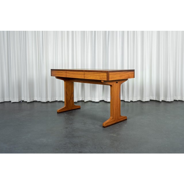 Mid Century desk, rosewood veneer, 3 drawers. Neat finishes on both sides. This item is excellent vintage and only shows...