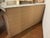 Stylish Baker Resort Tropez Console Table. Sculptural gray, beige and ivory travertine marble. Unfinished wood sides. AS...