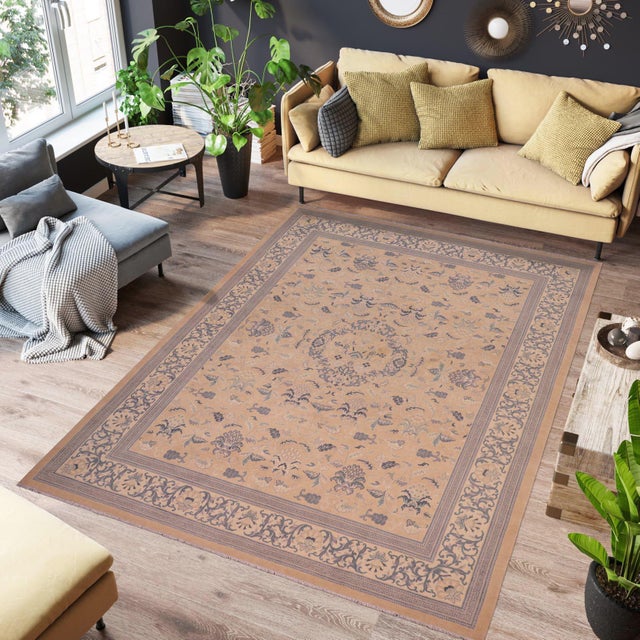 Enhance the ambiance of your home with this magnificent Persian-influenced Turkish hand-knotted rug made by skilled...