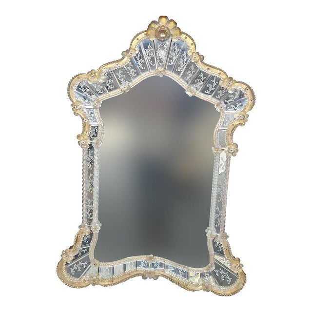 Elegant Venetian mirror made in the most rigorous Murano tradition with rich bands carefully engraved by hand. All...