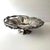 Decorative footed silver plate handled shallow bowl, or fruit basket with a swing handle that does not stay in an upright...