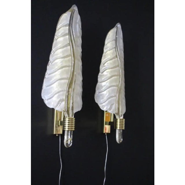 Here are three beautiful pairs of appliques in real murano soufflé white laiteux created in feuille or plume shapes on a...