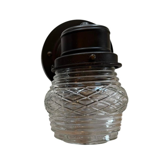 A classic pair of porch lights! Diamond cut glass with original painted over brass.