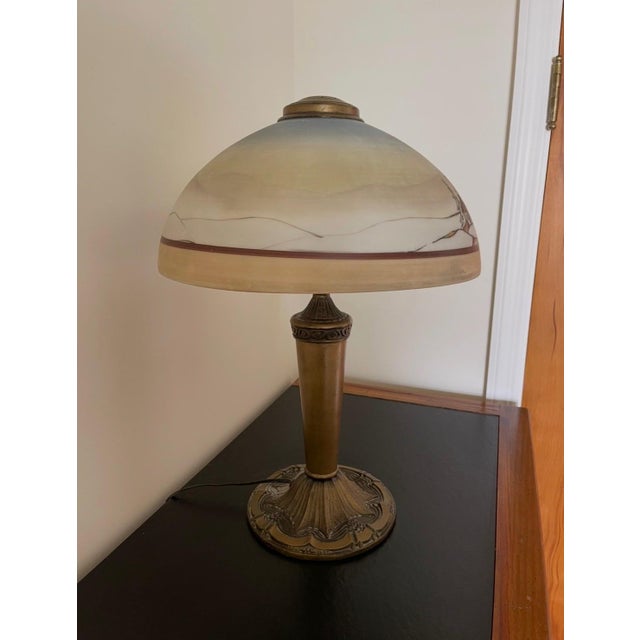 An Exceptional Luminous Work of Art from the Art Nouveau Era Step back into early 20th-century American craftsmanship with...