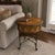 Add a touch of sophisticated, global-eclectic charm to your space with this exceptional drum-style accent table from the...