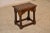 19th century oak joint stool from England. The top has a beveled edge, following down to scalloped aprons with routed...