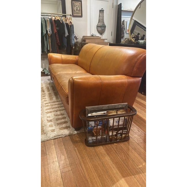 McCreary Modern leather rolled arm sofa. Ralph Lauren Style, full of charm and character, well distressed soft leather....