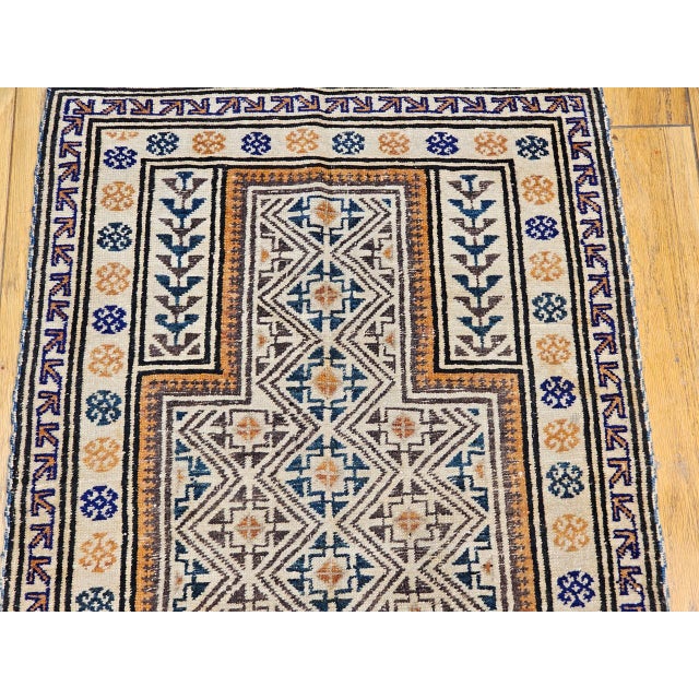 Early 20th Century Baluch Tribal Area Rug. Baluch rugs, woven by nomadic tribes across regions of Afghanistan, Pakistan,...