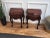 A pair of French carved decorated bedside tables night stands with two drawers.