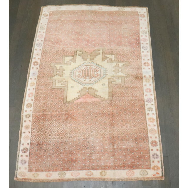 A mid 20th century soft colored Turkish Kars small rug