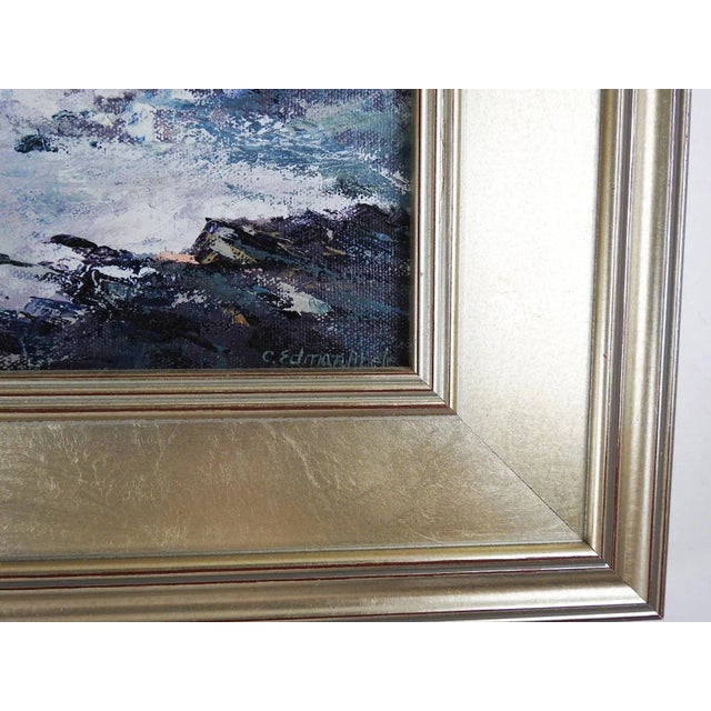 Contemporary oil on canvas painting of a rocky New England seacoast with lighthouse in the distance by Charlene Edman Abele (