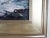 Contemporary oil on canvas painting of a rocky New England seacoast with lighthouse in the distance by Charlene Edman Abele (