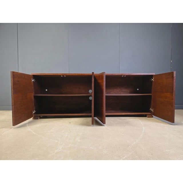 Large minimalist sideboard made from wenge wood, with a beautiful natural pattern. Notice how the wood has been carefully...