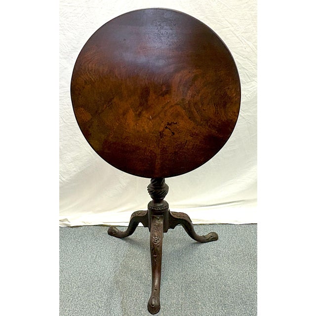 Just the perfect English flip-top table. The piece is beautifully made of walnut in a Chippendale style with an ornately...