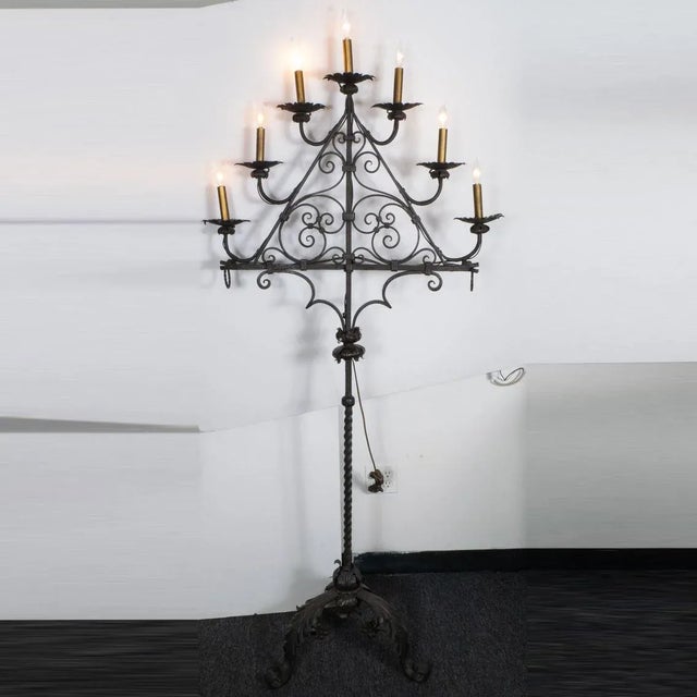 Gothic wrought iron candelabra style floor lamp.