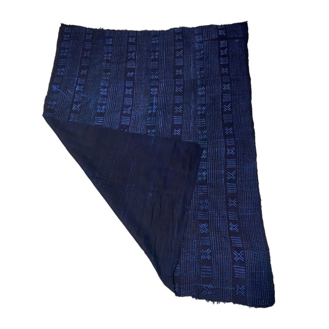 This fabric is woven by the skilled hands of the Mossi people in Burkina Faso. It is a rare and unique traditional...