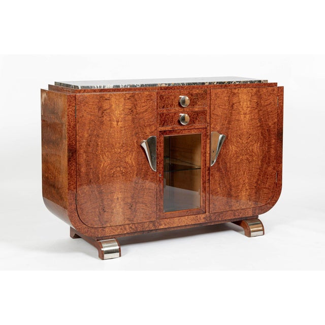 This exceptional French Art Deco sideboard buffet or bar cabinet was produced circa 1930. Impeccably crafted, the cabinet...