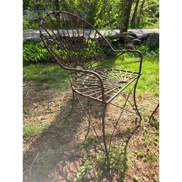 Vintage Wrought Iron Patio Outdoor Chairs This rare pair of Vintage Wrought Iron Patio Chairs features amazing...