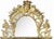 Wood Mirror French, 18th century, crest with mask of an Indian(?) and floral carving flanked by cornucopias, rectangular...
