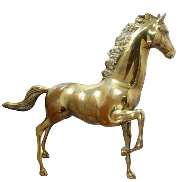 Add a touch of brass to your decor with this beautiful and impressive vintage stallion in a mellow quality brass. This...