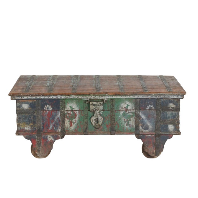 Antique Indian Teakwood Painted Blanket Chest/Coffee Table, a rolling chest on wheels with iron strapping and folksy...