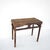 This rectangular side table is made from solid elm wood, featuring a multi-layered, molded edge on the tabletop. The frame...