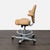 This HÅG Capisco chair features a unique saddle seat design and tan leather finish. The chair offers adjustable height and...