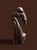 Mid century This item is a hand-carved wooden statue, commonly known as a "Thinking Man" or "African Thinker" sculpture,...