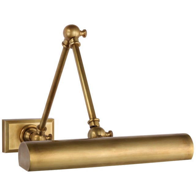 Cabinet Maker 12" Double Library Light in Hand-Rubbed Antique Brass Designer: Chapman & Myers Height: 5.75" - 12.25"...