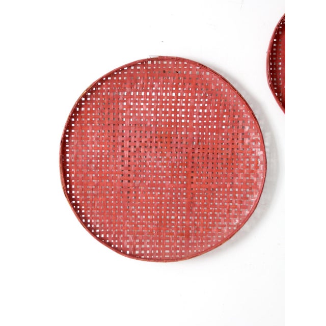 This pair of vintage tobacco baskets makes a bold statement with their pink-painted finish and substantial size....