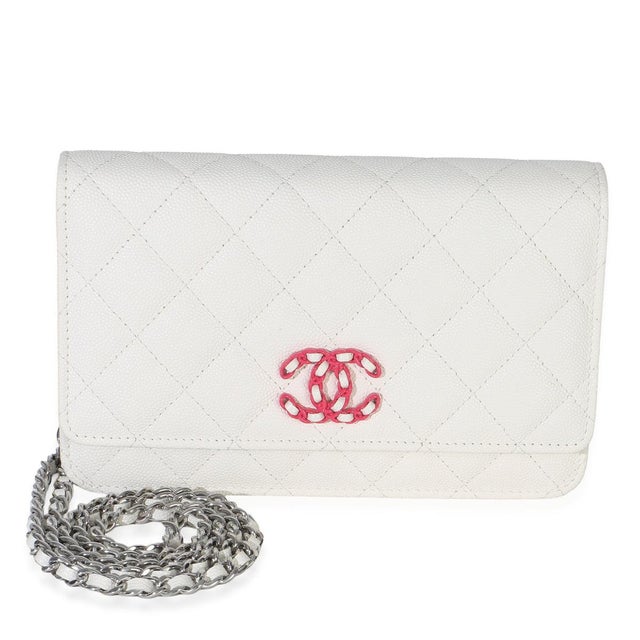 Item #: 153860 Interior Material: Fabric;Leather Size: Small Features Interior: Six card slots. Two slip pockets. Two zip...