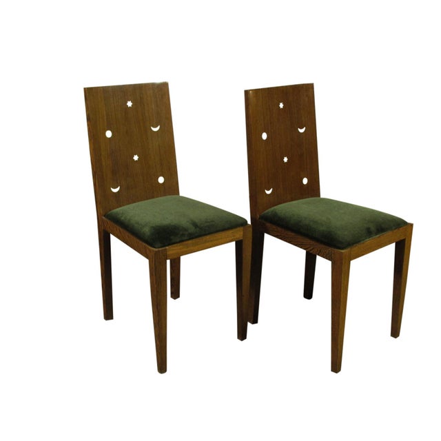 A pair of "Celeste" side chairs by Patrick Naggar. Features acajou wood construction inlaid with coquilla nut, and newly...