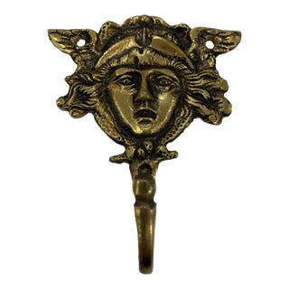 1950s Solid Brass Figural Hook For Sale