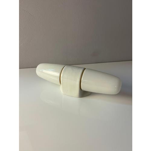 This double wall lamp, model 6068, was designed by Wilhelm Wagenfeld for the Lindner manufactory and embodies the...