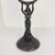 Vintage Art Nouveau figural vanity mirror made of cast spelter and featuring a flowing‑gowned lady lifting an oval mirror...