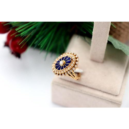 Gold ring with diamonds (48) in brilliant cut 8/8, enamelled centre and raised band. Metal: Gold. Origin: Portuguese....