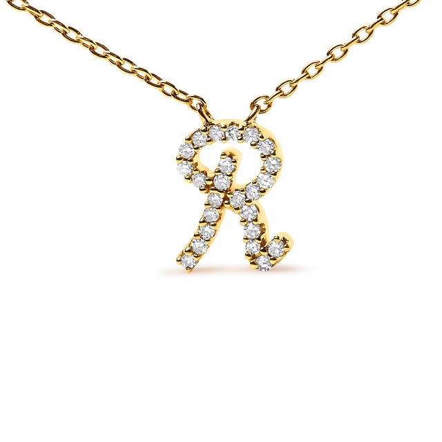 Embrace the elegance of personalization with this stunning 10K Yellow gold pendant, delicately crafted into a flowing...