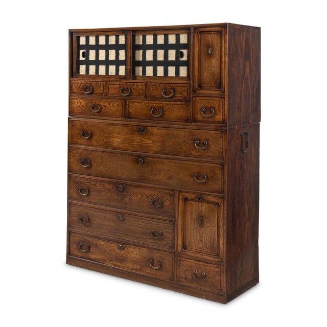 Antique Japanese wood tansu chest, believed to date to the Meiji period (1868–1912). Based on its design and...