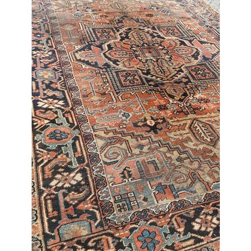 Beautiful late 19th century large Heriz rug with beautiful geometrical and stylized designs and nice natural colours with...