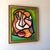 Vintage Picasso style cubist portrait painting. The painting is done in acrylics, and custom framed in the gold and black...