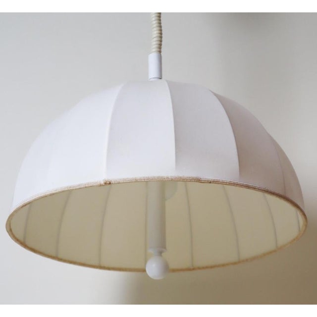This minimalist, height-adjustable pendant lamp is reminiscent of the designs of Hans-Agne Jacobsen, making it a perfect...