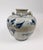 Blue and white wine jar with a floral motif. 16th-17th Century, Ming Dynasty