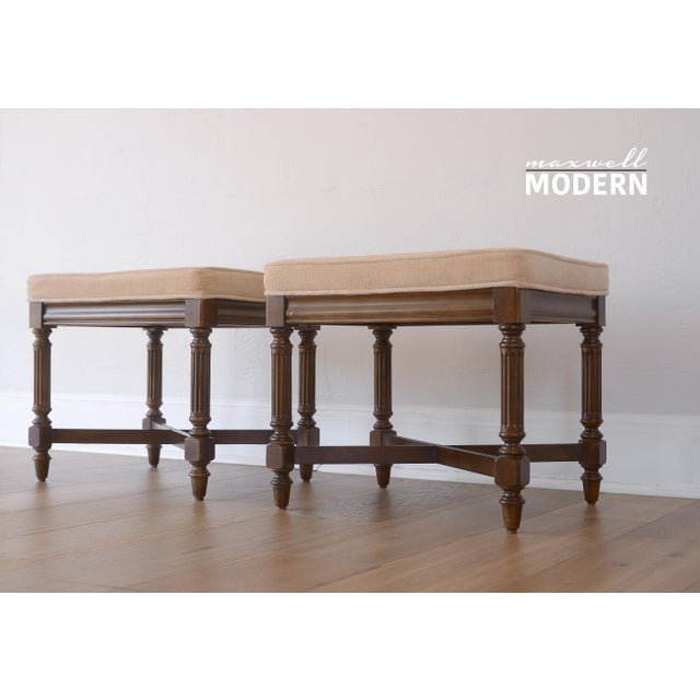 Gorgeous pair of vintage ottomans or stools from Gordon's of Tennessee in the style of Louis XVI. Upholstered in a velvet-...