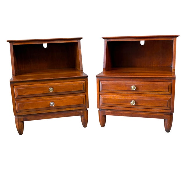 A very nice pair of Cherry, Mid Century Modern style, nightstands from Willett Furniture Co. Each nightstand features a...