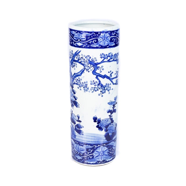Offering this stunning blue and white Chinese umbrella stand. With hand painted floral, birds, and other motifs.