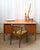 Elegant mid-century desk designed by Arne Vodder in the 1960s. Crafted in warm Danish teak, it features beautifully...